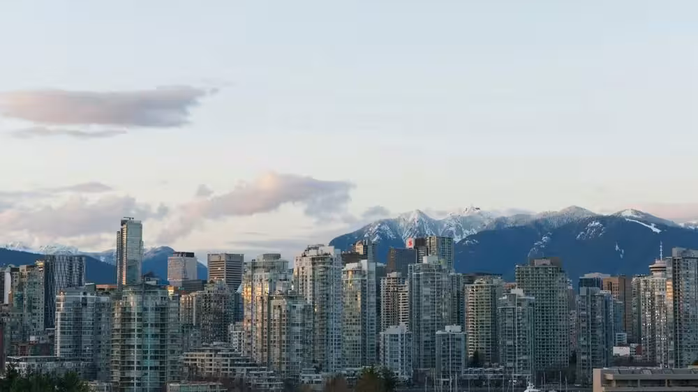 Vancouver, BC downtown skyline with mountains and waterfront