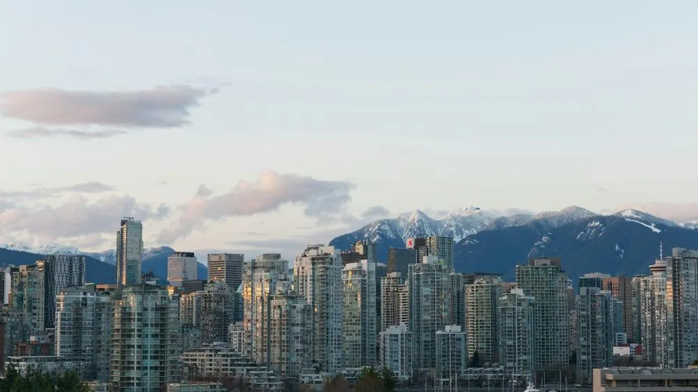 Vancouver, BC downtown skyline with mountains and waterfront